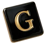 A black tile with the gold letter G